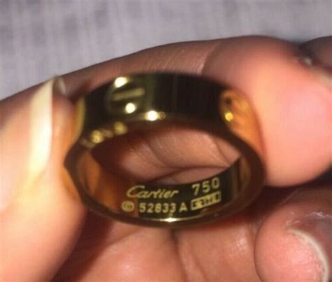 cartier 750 ring 52833a ito fake|cartier 750 ring counterfeit.